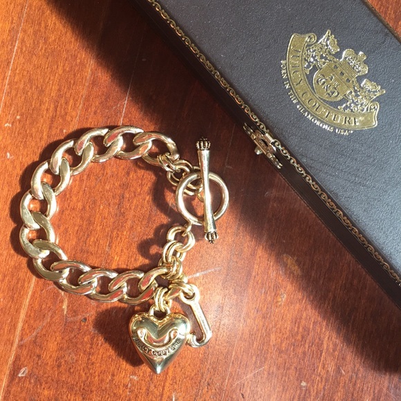 Juicy Couture Jewelry - Juicy Couture gold charm bracelet in box